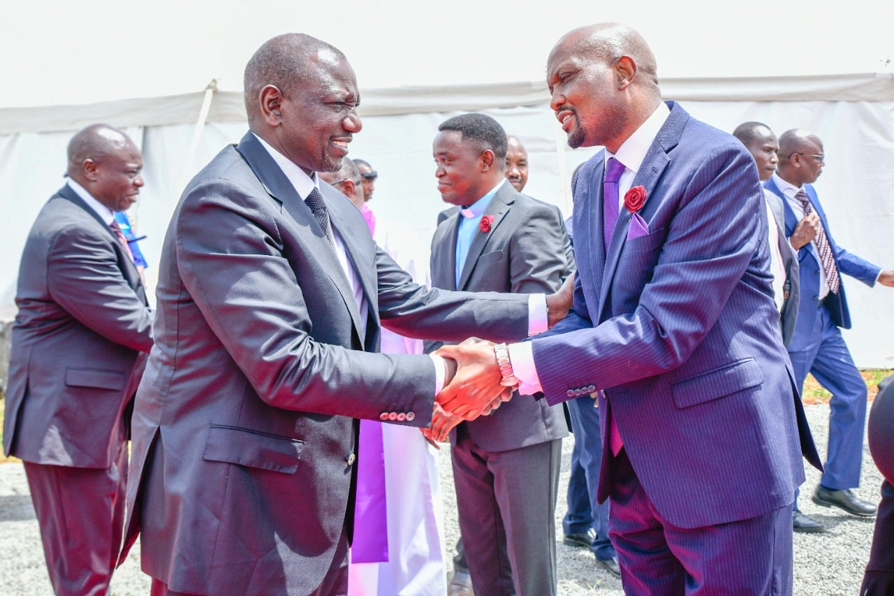 President William Ruto and Trade CS Moses Kuria.Ruto says he will not be intimidated by the opposition.Photo/PCS