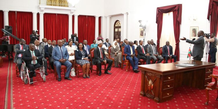 Presiding William Ruto with 30 MPs from the Jubilee party. PHOTO/COURTESY