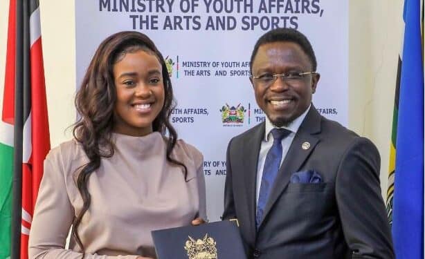 Azziad Nasenya posing for a photo with Sports Cabinet Secretary Ababu Namwamba.PHOTO/COURTESY