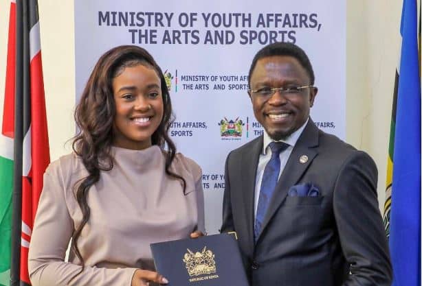 Azziad Nasenya posing for a photo with Sports Cabinet Secretary Ababu Namwamba.PHOTO/COURTESY