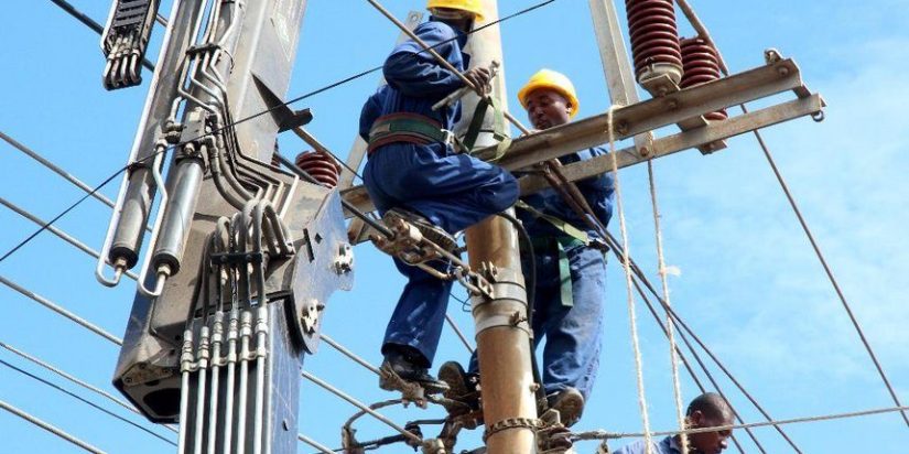 KPLC technicians fixing a power line.PHOTO/COURTESY