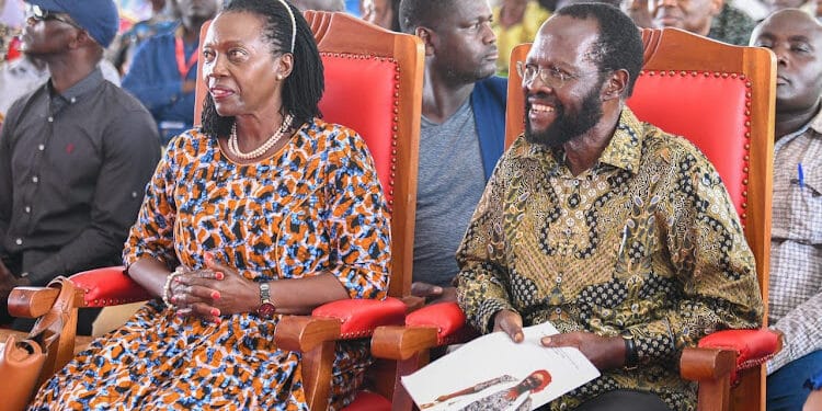 Martha Karua and Kisumu Governor Anyang Nyong'o during the burial of the late mama Grace Onyango in Gem, Nyanza on Friday, March 31.PHOTO/COURTESY