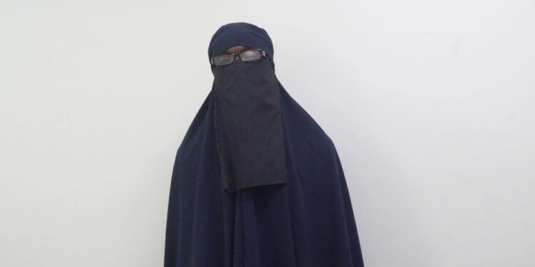 Chess Player Omondi disguised in a Hijab: PHOTO/Courtesy