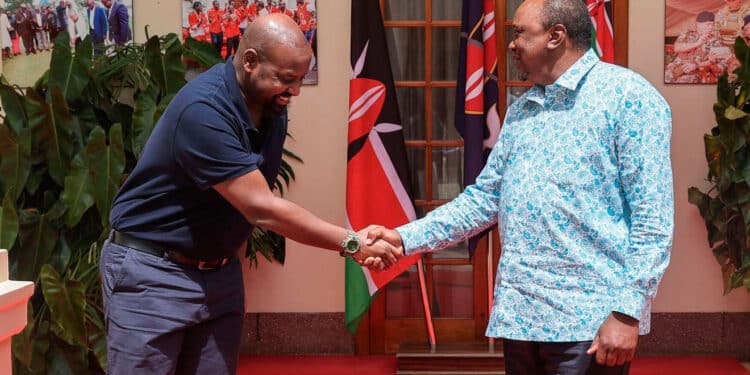 Former President Uhuru Kenyatta (R) with General Muhoozi (L) :PHOTO/Courtesy