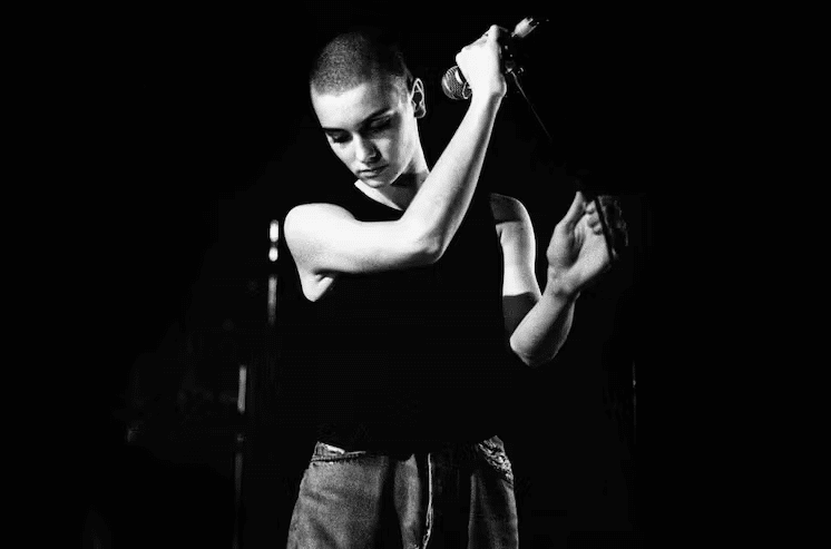 Irish singer Sinead O'Connor performs at Paradiso in Amsterdam in March 1988. Paul Bergen/Redferns via Getty Images