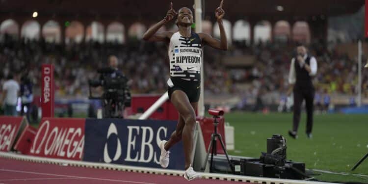 Coach Sang trains Kipyegon and Kipchonge.