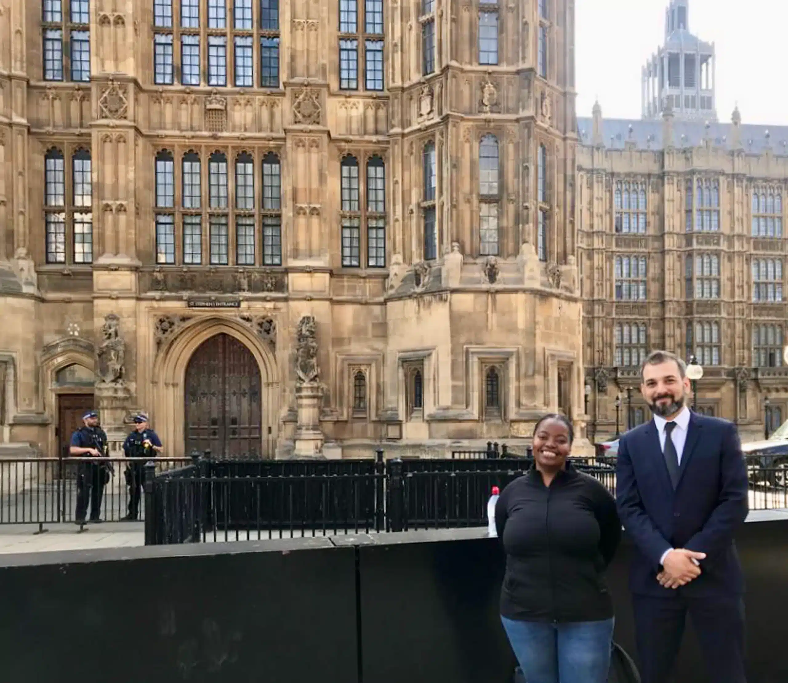 TBIJ reporter Emiliano Mellino and Sybil Msezane outside the House of Lords | TBIJ
