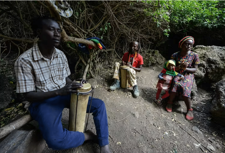 Rastafarians drum and sing during a special prayer and worship meeting at Menengai forest in Kenya. James Wakibia/SOPA Images/LightRocket via Getty Images