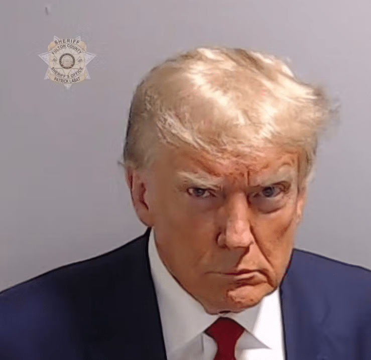 Donald Trump poses for his booking photo on August 24, 2023, in Atlanta. Fulton County Sheriff's Office via Getty Images