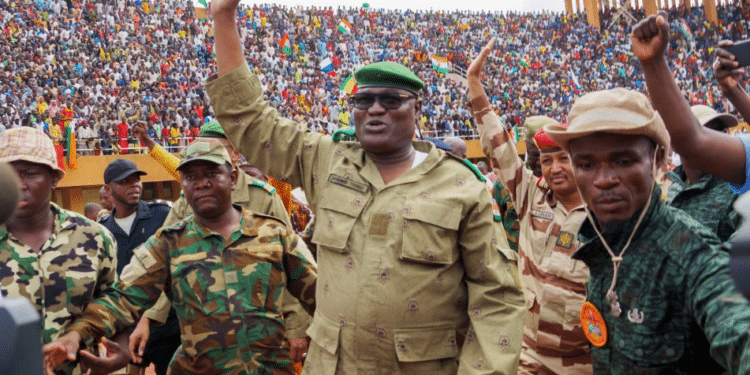 Niger coup and Junta leader Gen Abdourahmane Tchiani; part of a demonstration held by his supporters in Niamey on Sunday. Coutesy of Balima Boreima / Anadolu Agency via Getty Images