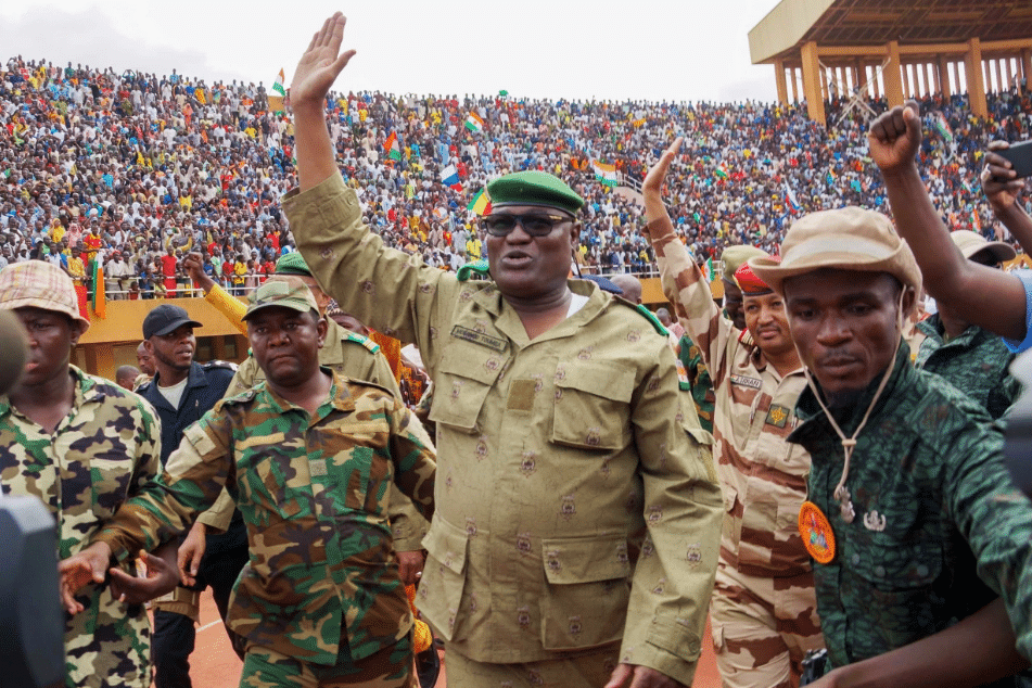 Niger coup and Junta leader Gen Abdourahmane Tchiani; part of a demonstration held by his supporters in Niamey on Sunday. Coutesy of Balima Boreima / Anadolu Agency via Getty Images