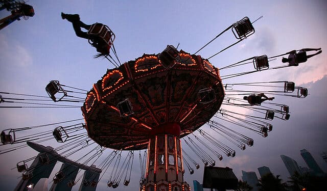 Boy in coma after falling on merry-go-round swing during school trip.