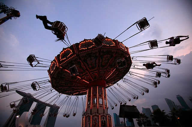 Boy in coma after falling on merry-go-round swing during school trip.