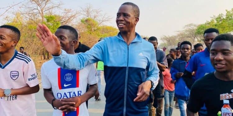 EX Zambian president greeting citizens during his jogging sessions.