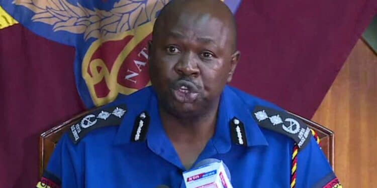 A Past Photo Of Ex-Police Spokesperson Charlse Owino Addresses The Press.