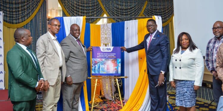 Energy Cabinet Secretary Davis Chirchir (third from right) and EPRA Director General Daniel Kiptoo (third from left) join other leaders in unveilling the