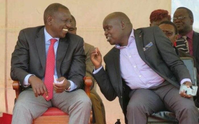 Nandi Senator Samson Cherargei sharing a light moment with President William Ruto. PHOTO/Courtesy