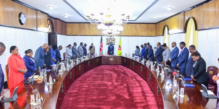 President William Ruto leads cabinet secretaries in prayer during a cabinet meeting on October 3, 2023 at State House.