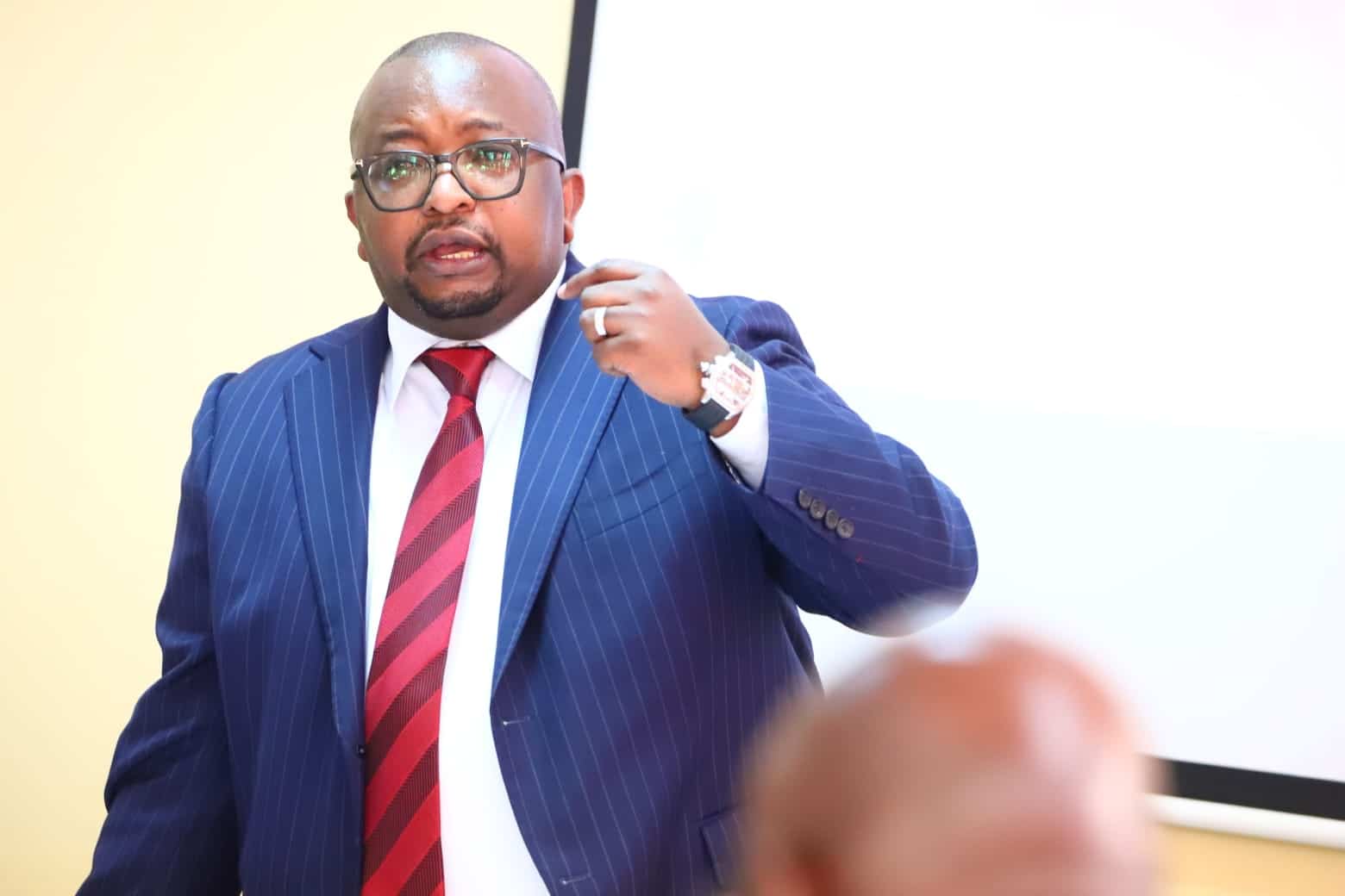 Housing PS Charles Hinga speaks during a past meeting.