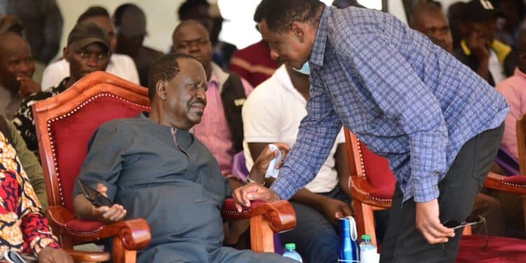 ODM Leader Raila Odinga (sitting) consults with Siaya Governor James Orengo in a past function.