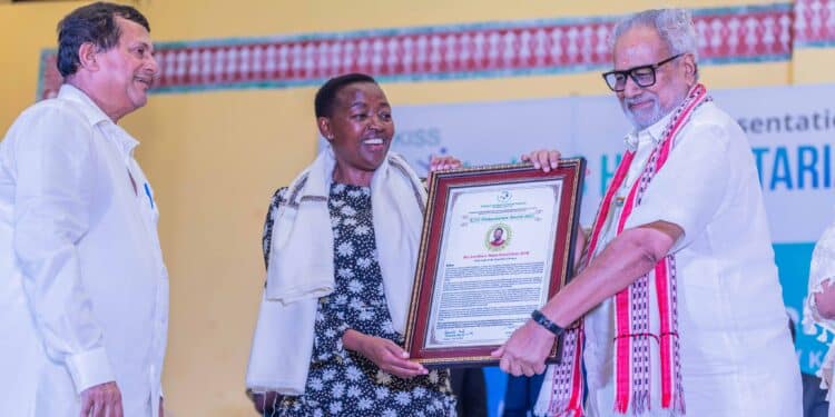 First Lady Rachel Ruto (center) receives the KISS Humanitarian Award 2022 in India on September 30, 2023.