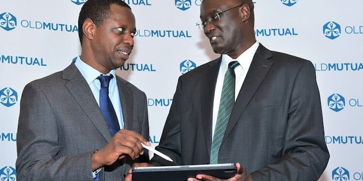 David Muchai, Old Mutual Group chief financial officer alongside the firm's CEO Arthur Oginga during the announcement of Old Mutual Holdings PLC’s half-year results in Nairobi on September 27, 2024. PHOTO/Old Mutual.