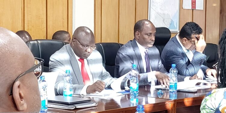 Cooperatives Cabinet Secretary Simon Chelugui (In Red Tie) Attends A Past Meeting.