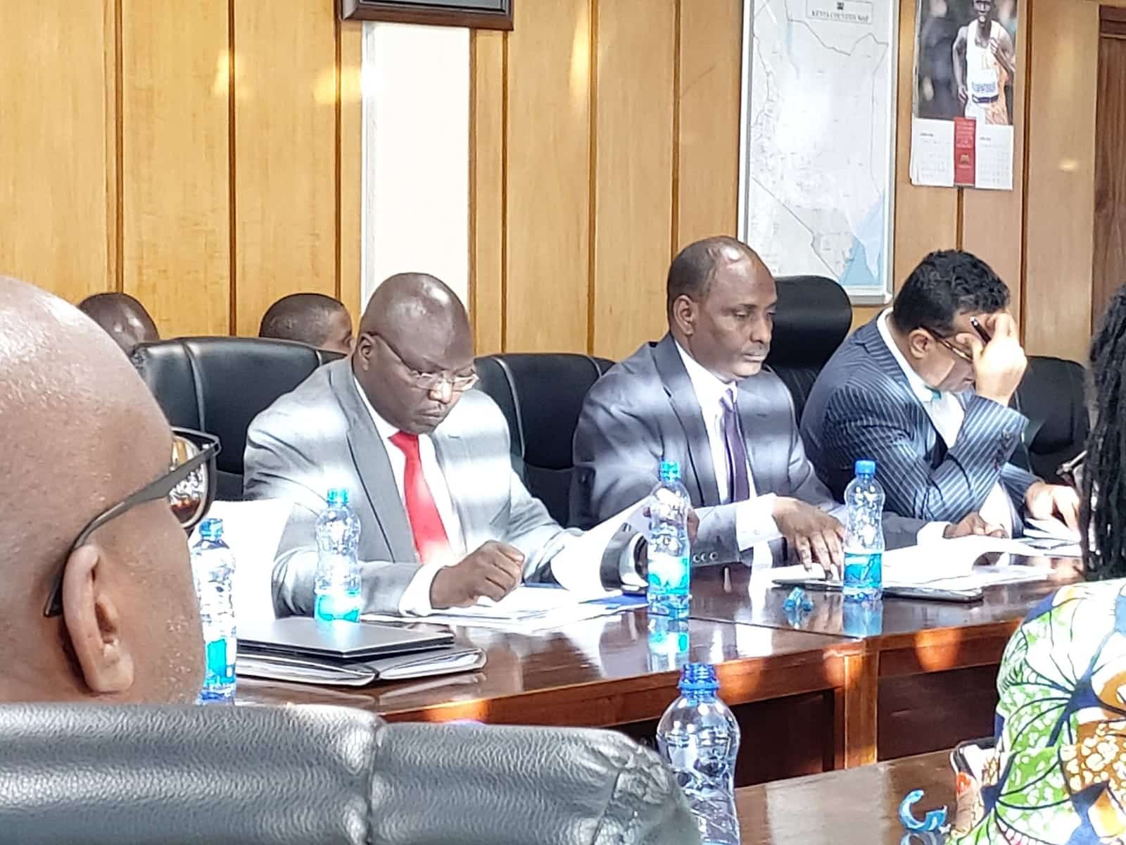 Cooperatives Cabinet Secretary Simon Chelugui (in red tie) attends a past meeting.