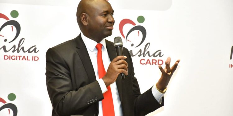 Immigration and Citizen Services PS Julius Bitok. He explained that new-borns will be implanted with micro chips in the digital ID program A side by side photo of President William Ruto and sample of passports. PHOTO/Courtesy.