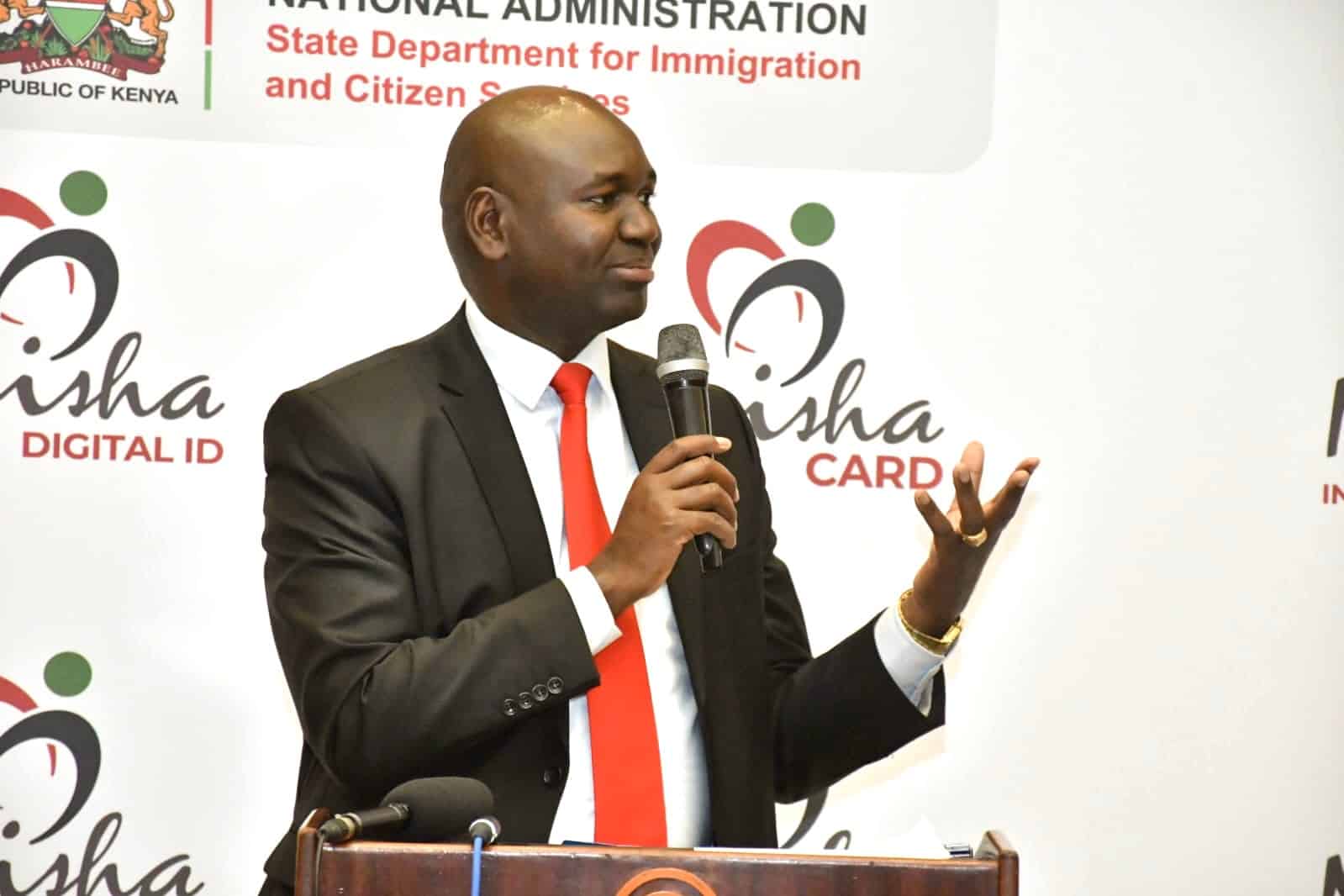 Immigration and Citizen Services PS Julius Bitok. He explained that new-borns will be implanted with micro chips in the digital ID program A side by side photo of President William Ruto and sample of passports. PHOTO/Courtesy.