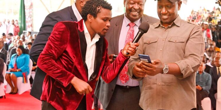 President William Ruto (right) shares a bright moment with Prime Cabinet Secretary Musalia Mudavadi during the launch of Hutsler Fund meant to support business men and women.