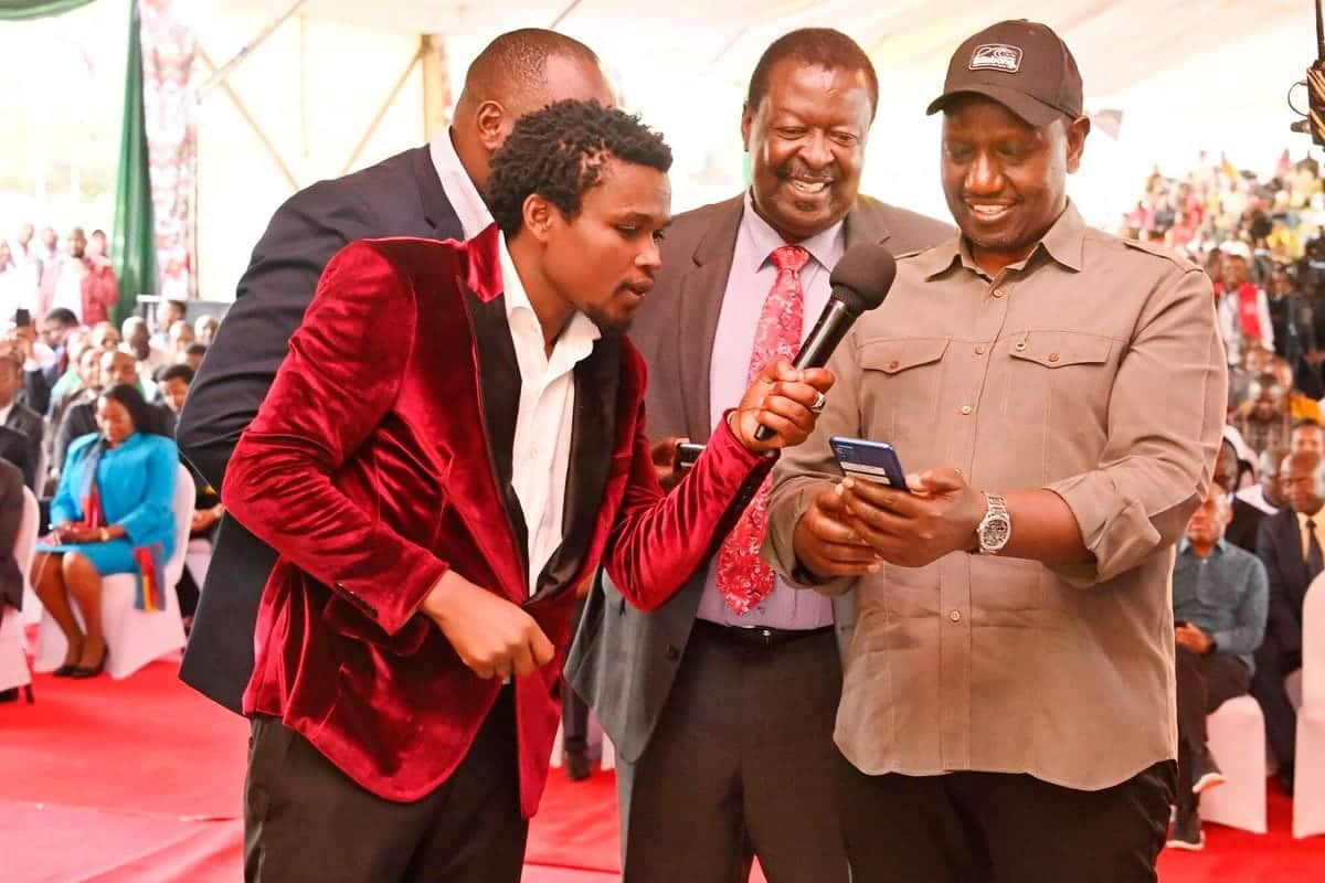 President William Ruto (right) shares a bright moment with Prime Cabinet Secretary Musalia Mudavadi during the launch of Hutsler Fund meant to support business men and women.