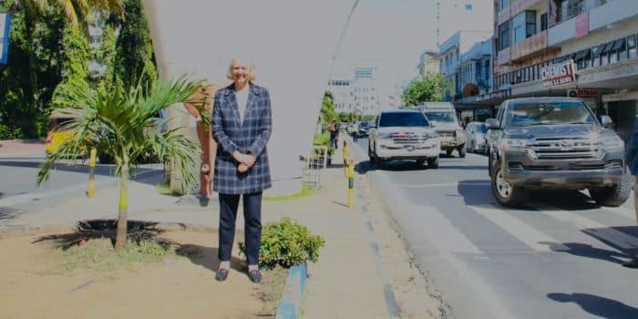 US Ambassador to Kenya Meg Whitman poses for a photo at the iconic tusks in Mombasa on November 20, 2023.