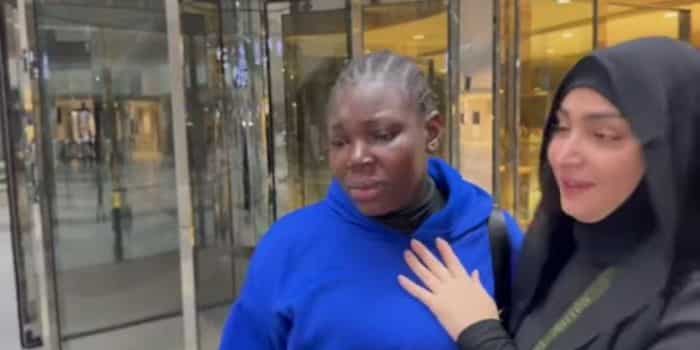 A screengrab of Rosie and her employer in an emotional moment at the airport.