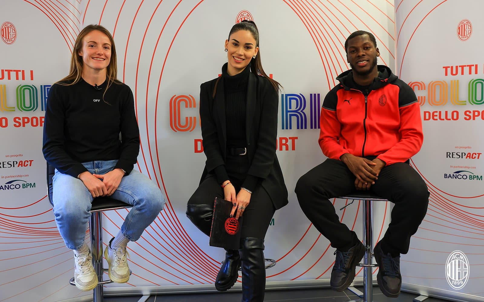 Christy Grimshaw (L) and Yunus Musah (R) with Milan TV host Licia Virdis.