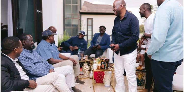 Saboti MP Caleb Amisi (standing) when he hosted Azimio leaders at his home in 2023.