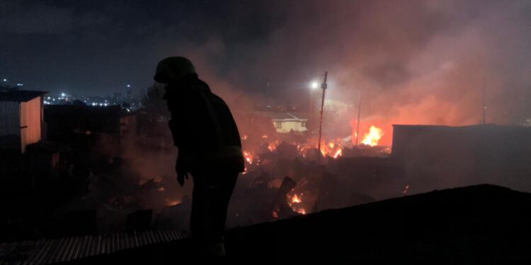 A fire fighter at the Scene in Lang'ata.