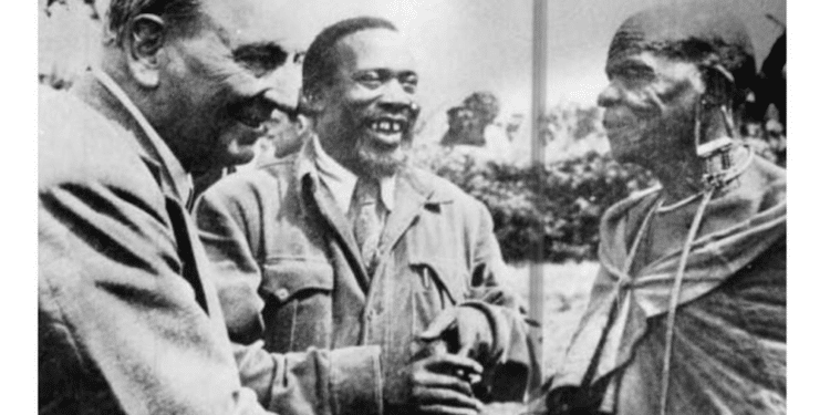 British Secretary of State for the Colonies, James Griffiths (left), talking to Former President Jomo Kenyatta and a Kikuyu elder in Kiambu in May 1951.