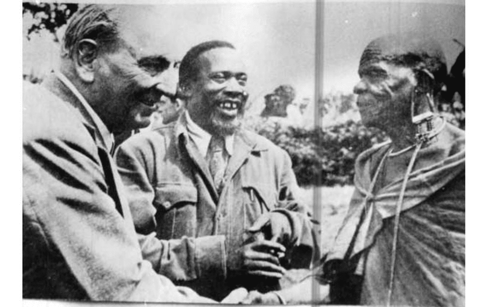 British Secretary of State for the Colonies, James Griffiths (left), talking to Former President Jomo Kenyatta and a Kikuyu elder in Kiambu in May 1951.