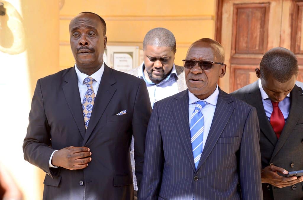 Kakamega Senator Boni Khalwale with his advocate Danstan Omari outside Milimani Law Courts. PHOTO/Khalwale X.
