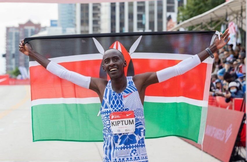 Kelvin Kiptum celebrates after winning the Chicago Marathon in 2023.