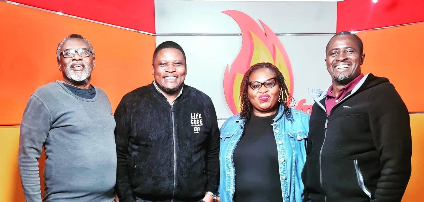 Tom Japanni 9second from left) poses for a photo with Spice FM's CT Muga, (left), Eric Latiff (right), and Ndu Okoh.