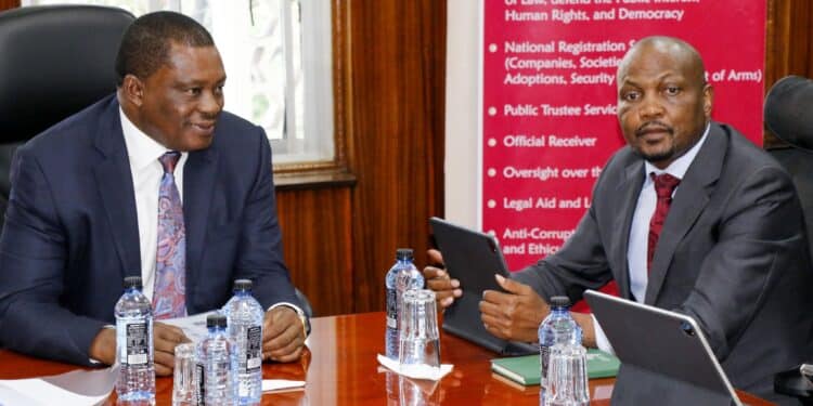 Attorney General Justin Muturi And Public Service Cabinet Secretary Moses Kuria In A Past Meeting.
