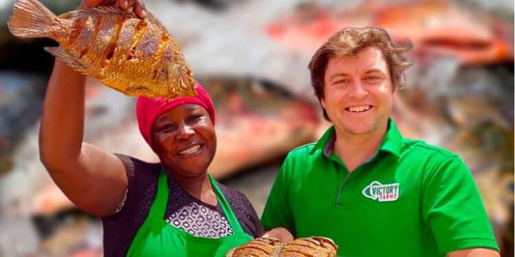 Maureen Adhiambo(L), fish trader at Nairobi West and Joseph Rehmann, founder of Victory Farm in Homa Bay County.