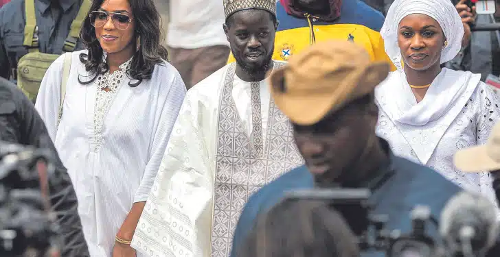 enegal President elect Bassirou Diomaye Faye and his two wives Marie Khone Faye and Absa Faye. PHOTO/COURTESY