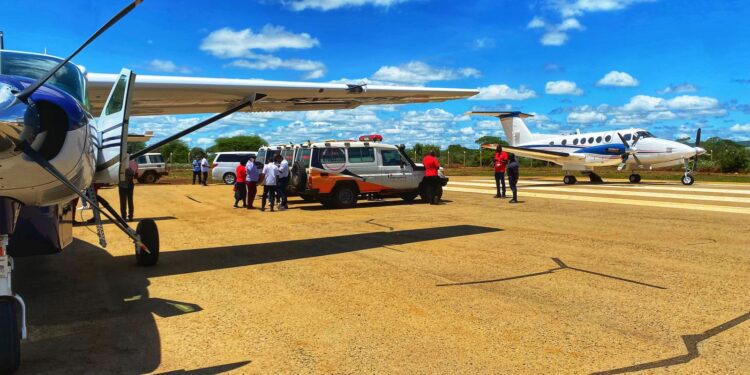 Paramedics From The Kenya Redcross And Amref Prepare To Airlift Survivors Of The Ku Bus Crash To Nairobi For Treatment On Tuesday, March 19.