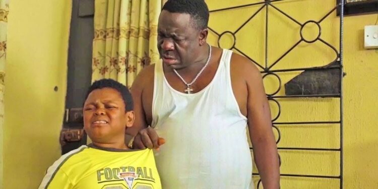 Nigerian Actor Mr Ibu or John Okafor on set with Pawpaw.