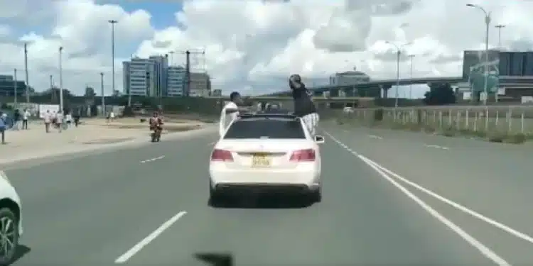 Youth Arrested After Being filmed hanging From Moving Car
