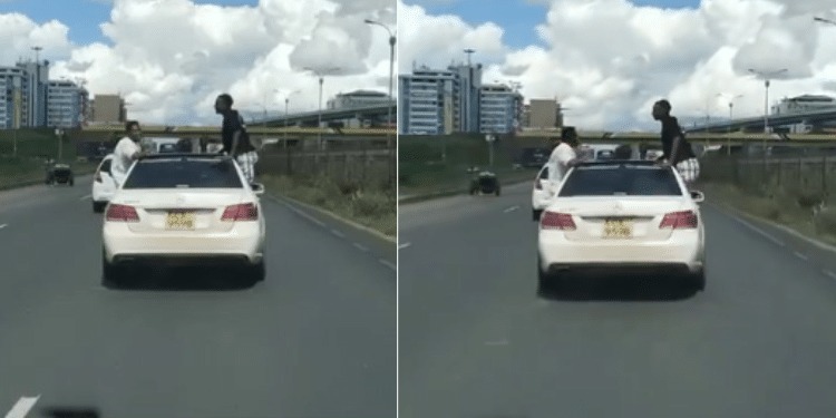 Photos of Two men captured hanging on a Mercedes Benz Captured on Mombasa Road. PHOTO/ Screen grab