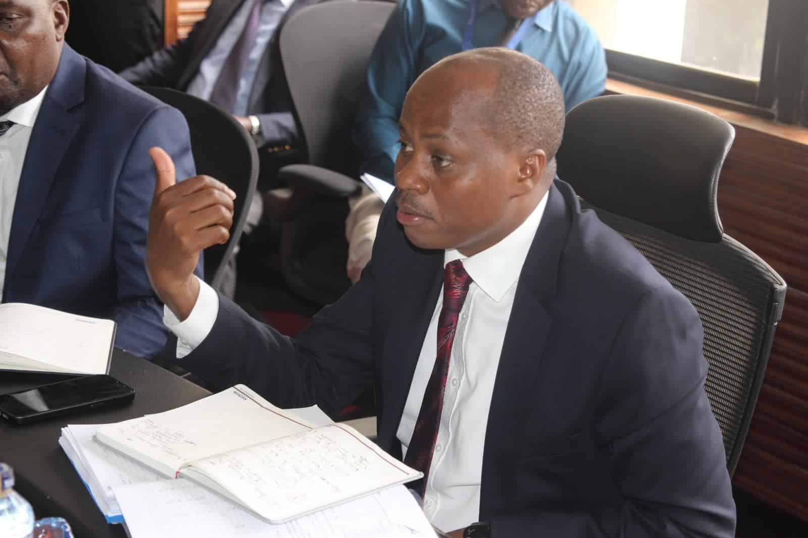 KEMSA Acting CEO Dr Andrew Mulwa speaking during a committee session in parliament.